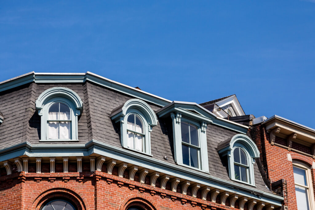Parisian style mansard roof on European building
