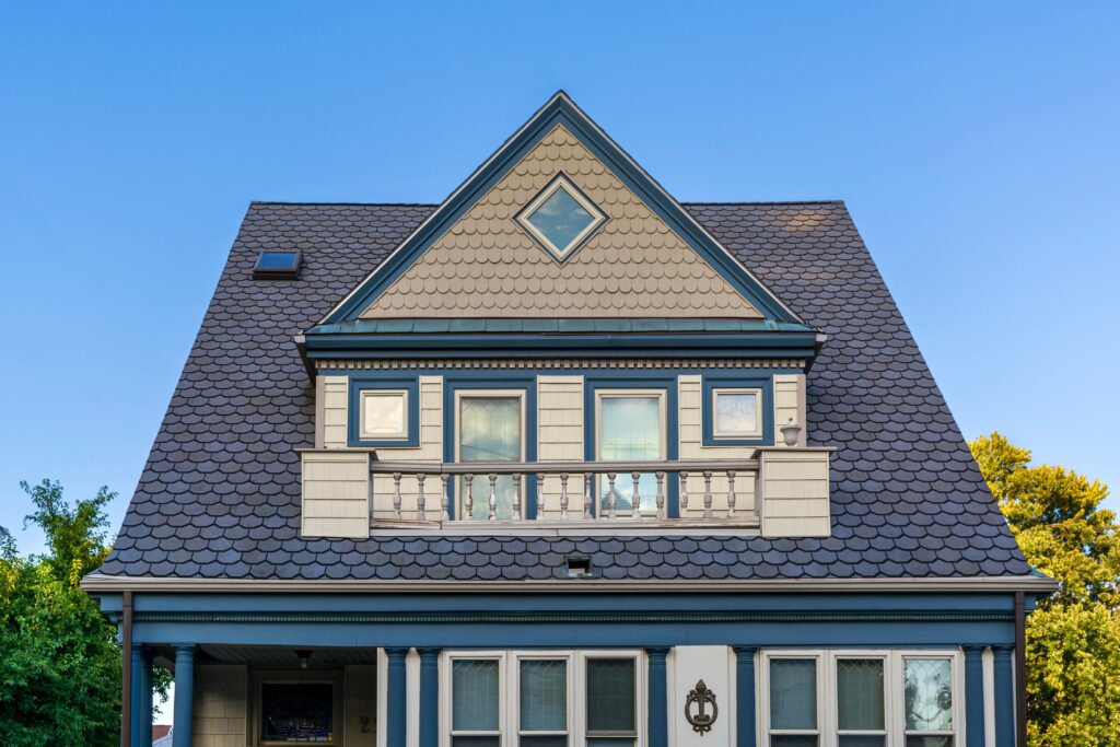 a gable roof on top of a hip roof